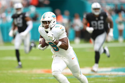 Nov 17, 2024; Miami Gardens, Florida, USA; Miami Dolphins tight end Jonnu Smith (9) breaks free for a touchdown late in the fourth quarter against the Las Vegas Raiders at Hard Rock Stadium. Mandatory Credit: Jim Rassol-Imagn Images