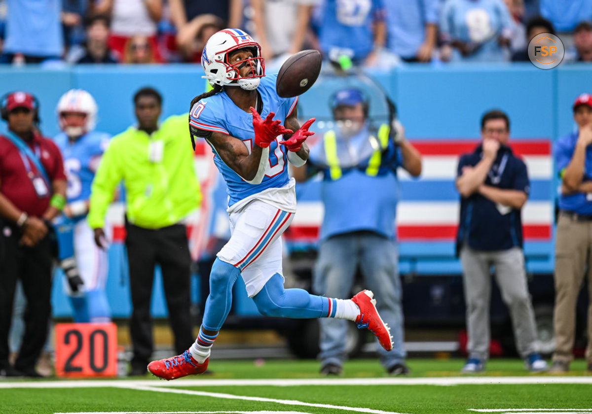 NASHVILLE, TN - OCTOBER 29: Tennessee Titans wide receiver DeAndre Hopkins (10) catches a touchdown pass during a game between the Tennessee Titans and the Atlanta Falcons on October 29, 2023, at Nissan Stadium in Nashville, TN.  (Photo by Bryan Lynn/Icon Sportswire)