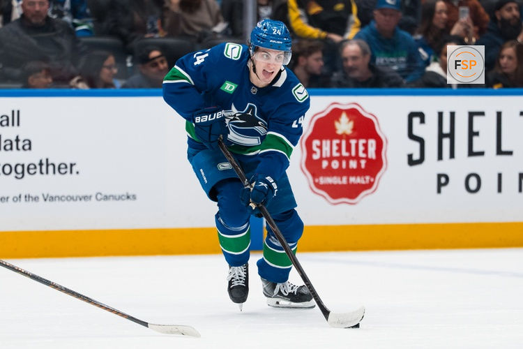 Apr 14, 2026; Vancouver, British Columbia, CAN; Vancouver Canucks defenseman Zeev Buium (24) handles the puck against the Los Angeles Kings in the second period at Rogers Arena. Credit: Bob Frid-Imagn Images