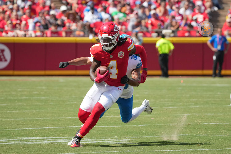 Aug 17, 2024; Kansas City, Missouri, USA; Kansas City Chiefs wide receiver Rashee Rice (4) runs the ball as Detroit Lions cornerback Khalil Dorsey (30) chases during the first half at GEHA Field at Arrowhead Stadium. Credit: Denny Medley-USA TODAY Sports