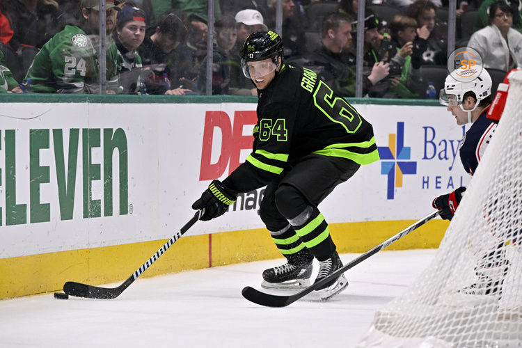 Feb 2, 2025; Dallas, Texas, USA; Dallas Stars center Mikael Granlund (64) skates against the Columbus Blue Jackets during the second period at the American Airlines Center. Credit: Jerome Miron-Imagn Images