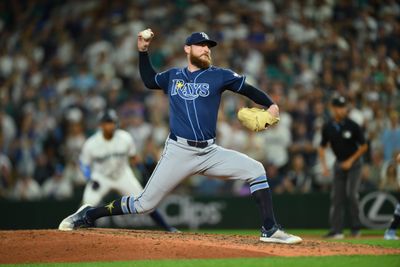 Aug 8, 2026; Seattle, Washington, USA; Tampa Bay Rays relief pitcher Bryan Baker (47) pitches to the Seattle Mariners during the ninth inning at T-Mobile Park. Mandatory Credit: Steven Bisig-Imagn Images