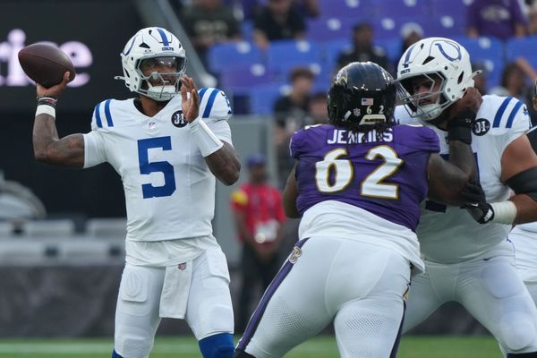 Aug 7, 2025; Baltimore, Maryland, USA; Indianapolis Colts quarterback Anthony Richardson Sr. (5) looks to pass during the first quarter pressured by Baltimore Ravens nose tackle John Jenkins (62) at M&T Bank Stadium. Mandatory Credit: Mitch Stringer-Imagn Images