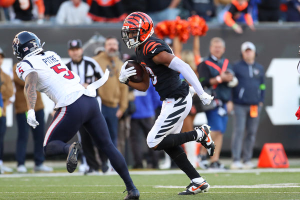 CINCINNATI, OH - NOVEMBER 12: Cincinnati Bengals wide receiver Tyler Boyd (83) carries the ball during the game against the Houston Texans and the Cincinnati Bengals on November 12, 2023, at Paycor Stadium in Cincinnati, OH. (Photo by Ian Johnson/Icon Sportswire)