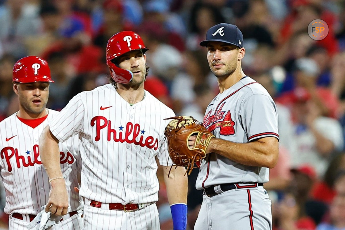 PHILADELPHIA, PA - SEPTEMBER 12:  Bryce Harper #3 of the Philadelphia Phillies and Matt Olson #28 of the Atlanta Braves during the Major League Baseball game on September 12, 2023 at Citizens Bank Park in Philadelphia, Pennsylvania.  (Photo by Rich Graessle/Icon Sportswire)