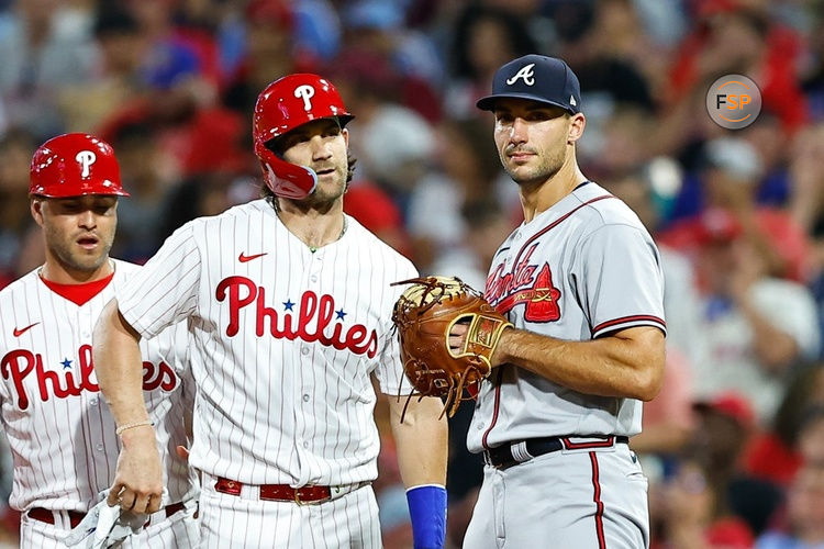 PHILADELPHIA, PA - SEPTEMBER 12:  Bryce Harper #3 of the Philadelphia Phillies and Matt Olson #28 of the Atlanta Braves during the Major League Baseball game on September 12, 2023 at Citizens Bank Park in Philadelphia, Pennsylvania.  (Photo by Rich Graessle/Icon Sportswire)