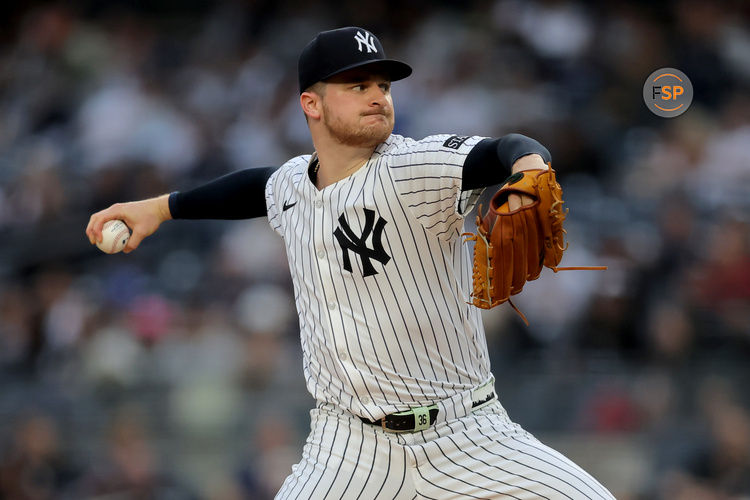 Jun 16, 2025; Bronx, New York, USA; New York Yankees starting pitcher Clarke Schmidt (36) pitches against the Los Angeles Angels during the first inning at Yankee Stadium. Credit: Brad Penner-Imagn Images