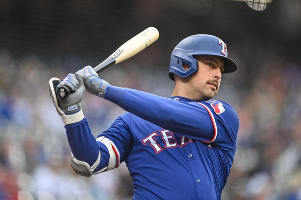 DENVER, CO - MAY 10: Texas Rangers first base Nathaniel Lowe (30) warms up before batting in the first inning during a game between the Texas Rangers and the Colorado Rockies at Coors Field on May 10, 2024 in Denver, Colorado. (Photo by Dustin Bradford/Icon Sportswire)