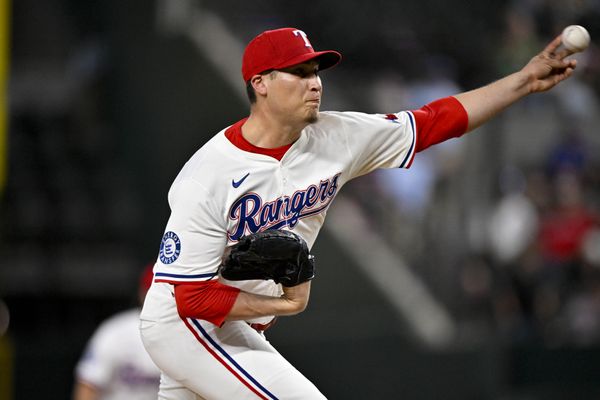 Jun 30, 2025; Arlington, Texas, USA; Texas Rangers relief pitcher Robert Garcia (62) pitches against the Baltimore Orioles during the tenth inning at Globe Life Field. Mandatory Credit: Jerome Miron-Imagn Images