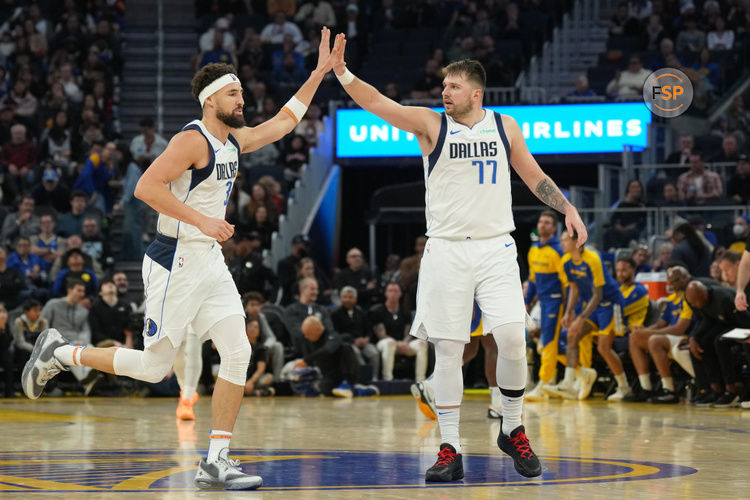 Dec 15, 2024; San Francisco, California, USA; Dallas Mavericks guard Klay Thompson (left) is congratulated by guard Luka Doncic (77) after scoring against the Golden State Warriors during the third quarter at Chase Center. Credit: Darren Yamashita-Imagn Images