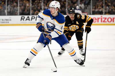 Apr 23, 2026; Boston, Massachusetts, USA; Buffalo Sabres defenseman Bowen Byram (4) skates against Boston Bruins right wing David Pastrnak (88) during the second period of game three of the first round of the 2026 Stanley Cup Playoffs at the TD Garden. Mandatory Credit: Brian Fluharty-Imagn Images