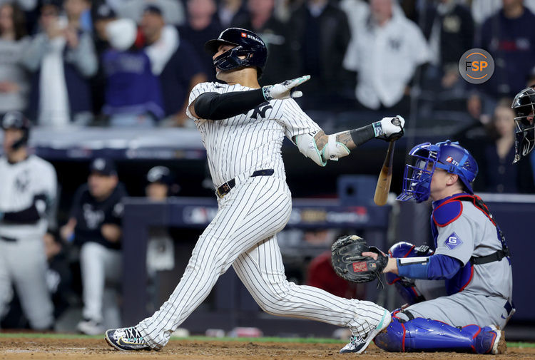 Oct 29, 2024; New York, New York, USA; New York Yankees second baseman Gleyber Torres (25) hits a three-run home run during the eighth inning against the Los Angeles Dodgers in game four of the 2024 MLB World Series at Yankee Stadium. Credit: Brad Penner-Imagn Images