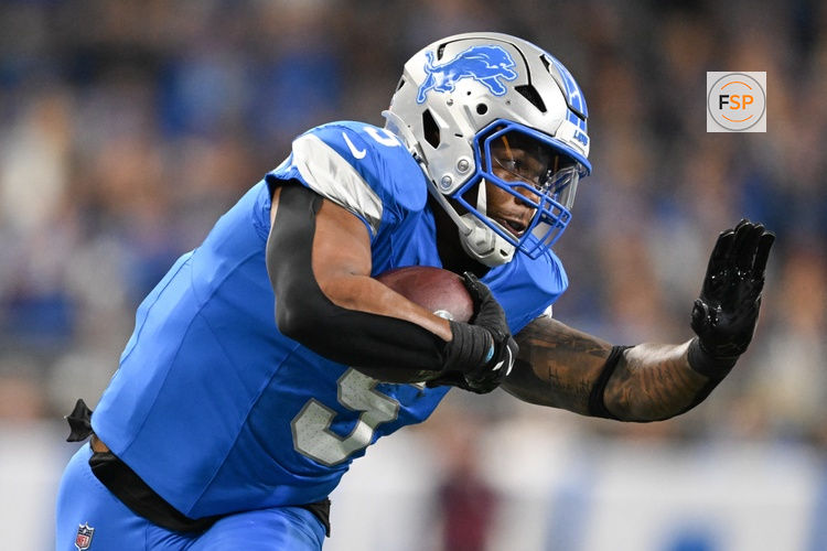 Sep 14, 2025; Detroit, Michigan, USA; Detroit Lions running back David Montgomery (5) carries the ball against the Chicago Bears during the second quarter of the game at Ford Field. Credit: Lon Horwedel-Imagn Images