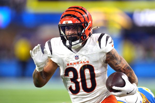 Nov 17, 2024; Inglewood, California, USA; Cincinnati Bengals running back Chase Brown (30) carries the ball against the Los Angeles Chargers in the second half at SoFi Stadium. Mandatory Credit: Kirby Lee-Imagn Images