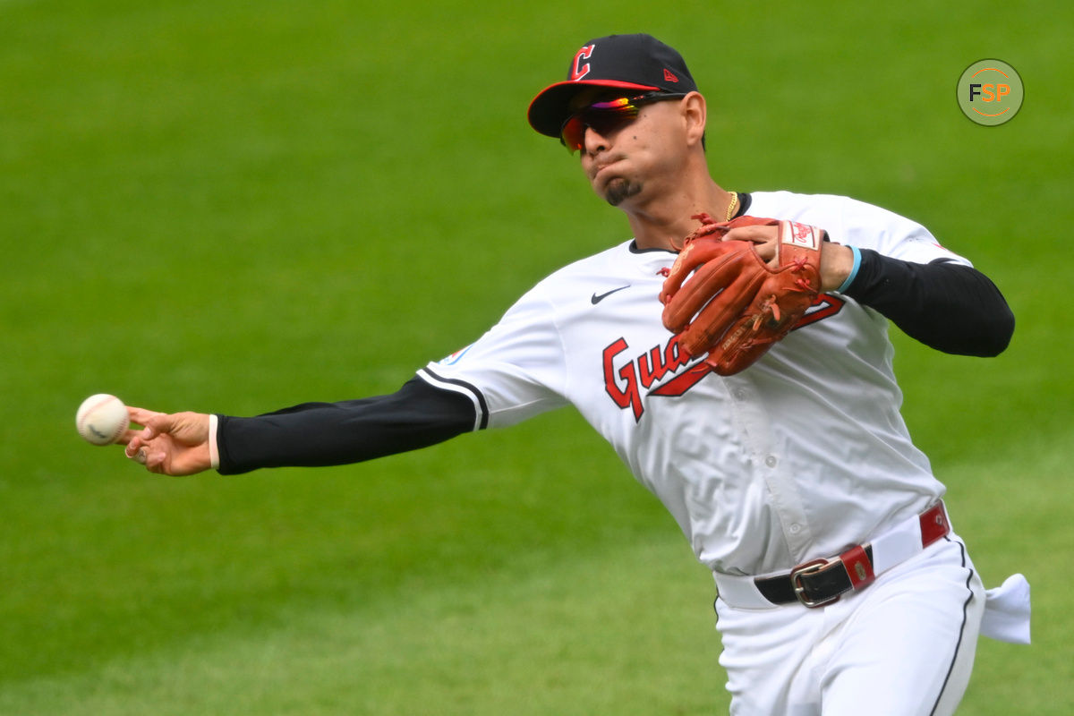 Sep 1, 2024; Cleveland, Ohio, USA; Cleveland Guardians second baseman Andres Gimenez (0) throws to first base in the second inning against the Pittsburgh Pirates at Progressive Field. Credit: David Richard-USA TODAY Sports