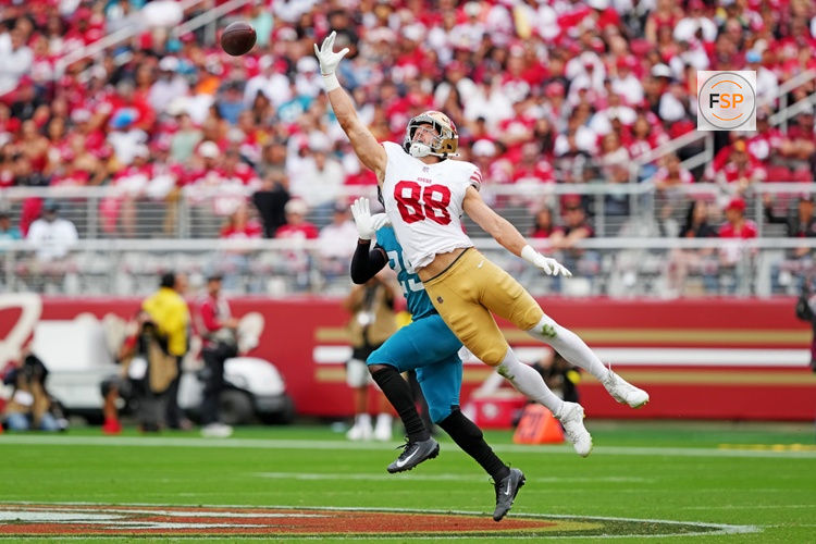 Sep 28, 2025; Santa Clara, California, USA; San Francisco 49ers tight end Jake Tonges (88) jumps to make a catch during the second half against the Jacksonville Jaguars at Levi's Stadium. Credit: Darren Yamashita-Imagn Images
