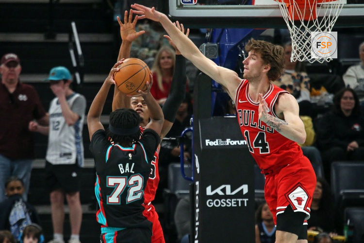 Mar 28, 2026; Memphis, Tennessee, USA; Memphis Grizzlies guard Adama Bal (72) shoots against Chicago Bulls forward Isaac Okoro (35) and Chicago Bulls forward Matas Buzelis (14) during the fourth quarter at FedExForum. Credit: Petre Thomas-Imagn Images