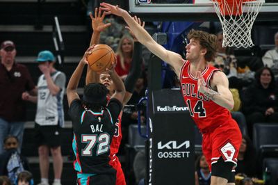 Mar 28, 2026; Memphis, Tennessee, USA; Memphis Grizzlies guard Adama Bal (72) shoots against Chicago Bulls forward Isaac Okoro (35) and Chicago Bulls forward Matas Buzelis (14) during the fourth quarter at FedExForum. Mandatory Credit: Petre Thomas-Imagn Images