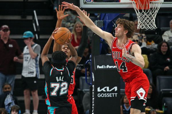 Mar 28, 2026; Memphis, Tennessee, USA; Memphis Grizzlies guard Adama Bal (72) shoots against Chicago Bulls forward Isaac Okoro (35) and Chicago Bulls forward Matas Buzelis (14) during the fourth quarter at FedExForum. Mandatory Credit: Petre Thomas-Imagn Images
