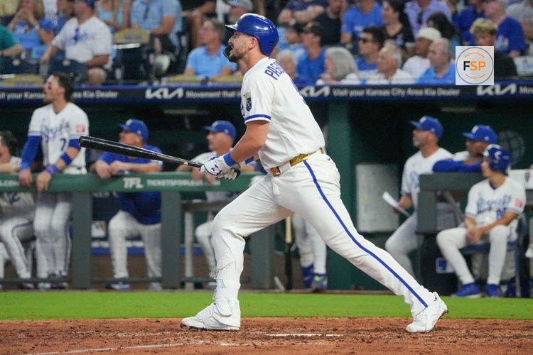Aug 19, 2026; Kansas City, Missouri, USA; Kansas City Royals first baseman Vinnie Pasquantino (9) hits a solo home run against the Athletics during the sixth inning at Kauffman Stadium. Credit: Denny Medley-Imagn Images
