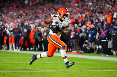 Dec 2, 2024; Denver, Colorado, USA; Cleveland Browns running back Nick Chubb (24) scores a touchdown in the fourth quarter against the Denver Broncos at Empower Field at Mile High. Mandatory Credit: Ron Chenoy-Imagn Images