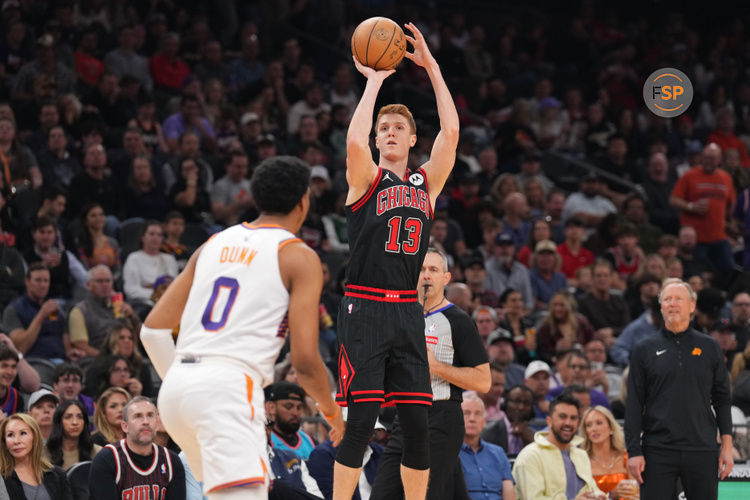 Mar 19, 2025; Phoenix, Arizona, USA; Chicago Bulls guard Kevin Huerter (13) shoots against the Phoenix Suns during the first half at PHX Aena. Credit: Joe Camporeale-Imagn Images