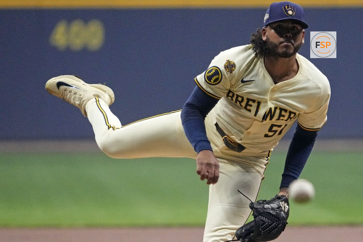 Oct 14, 2025; Milwaukee, Wisconsin, USA; Milwaukee Brewers pitcher Freddy Peralta (51) throws pitch against the Los Angeles Dodgers in the first inning during game two of the NLCS round for the 2025 MLB playoffs at American Family Field. Credit: Michael McLoone-Imagn Images