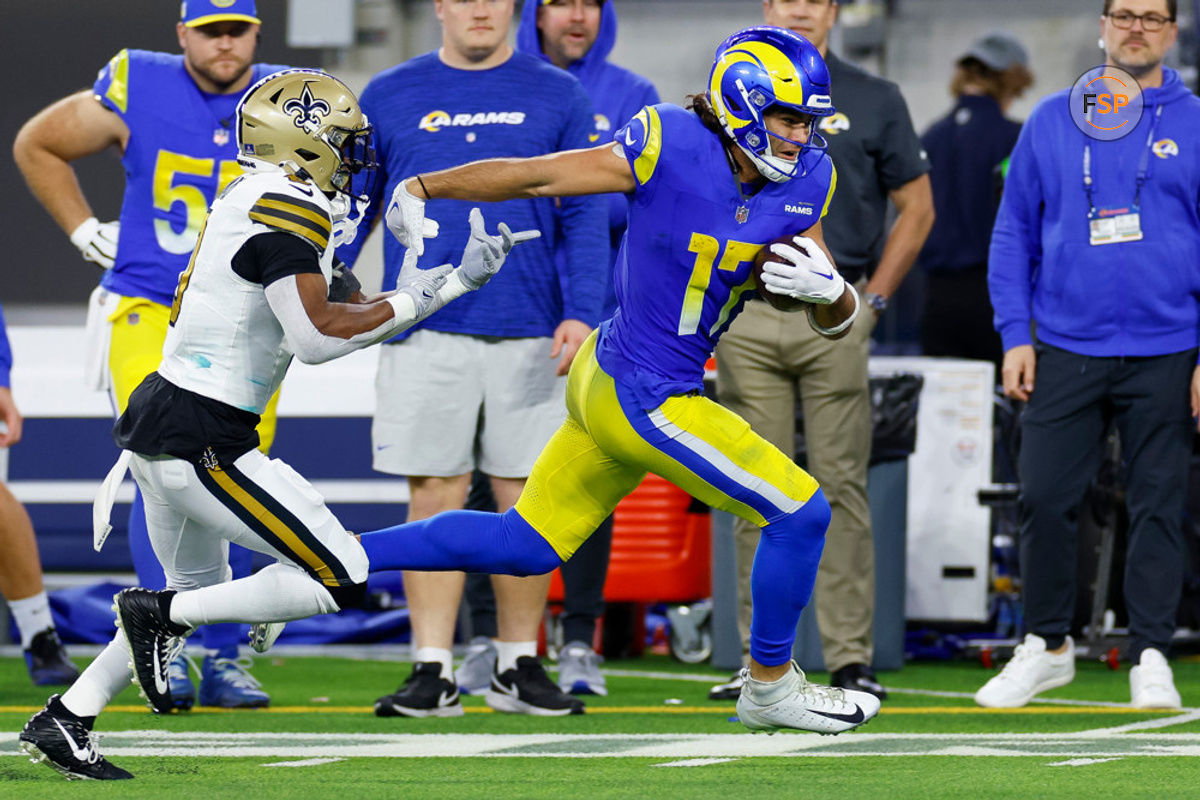 INGLEWOOD, CA - DECEMBER 21: Los Angeles Rams wide receiver Puka Nacua (17) runs with the ball in the second half during an NFL regular season game between the New Orleans Saints and the Los Angeles Rams on December 21, 2023, at SoFi Stadium in Inglewood, CA. (Photo by Brandon Sloter/Icon Sportswire)