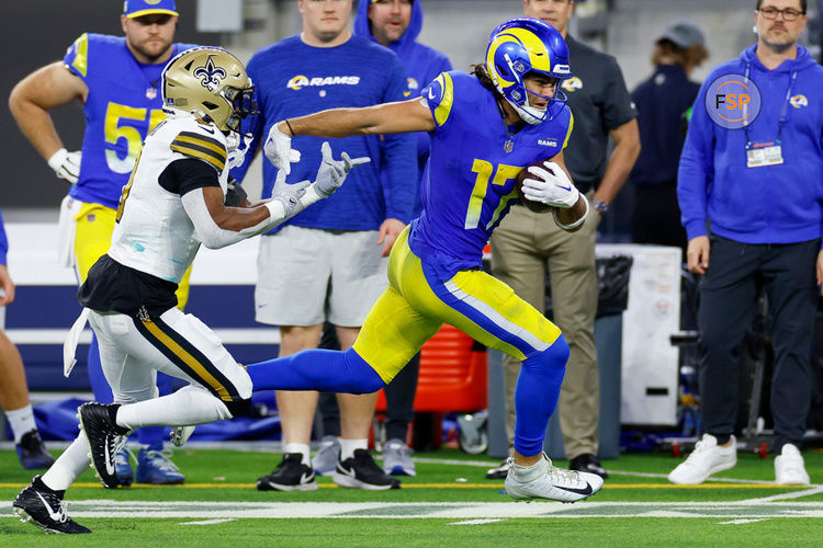 INGLEWOOD, CA - DECEMBER 21: Los Angeles Rams wide receiver Puka Nacua (17) runs with the ball in the second half during an NFL regular season game between the New Orleans Saints and the Los Angeles Rams on December 21, 2023, at SoFi Stadium in Inglewood, CA. (Photo by Brandon Sloter/Icon Sportswire)