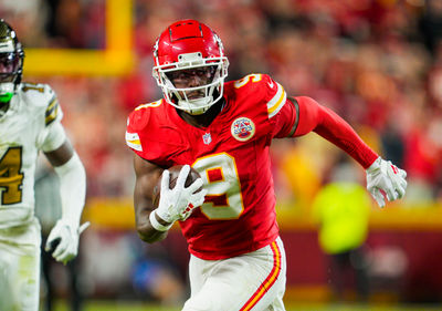 Oct 7, 2024; Kansas City, Missouri, USA; Kansas City Chiefs wide receiver JuJu Smith-Schuster (9) runs with the ball during the first half against the New Orleans Saints at GEHA Field at Arrowhead Stadium. Mandatory Credit: Jay Biggerstaff-Imagn Images