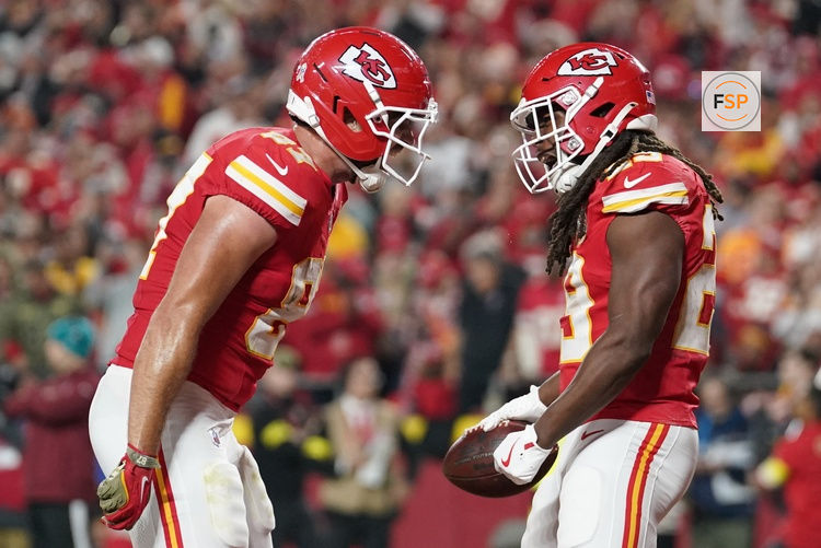 Oct 27, 2025; Kansas City, Missouri, USA; Kansas City Chiefs running back Kareem Hunt (29) celebrates after scoring a touchdown against the Washington Commanders with tight end Travis Kelce (87) during the third quarter of the game at GEHA Field at Arrowhead Stadium. Credit: Denny Medley-Imagn Images