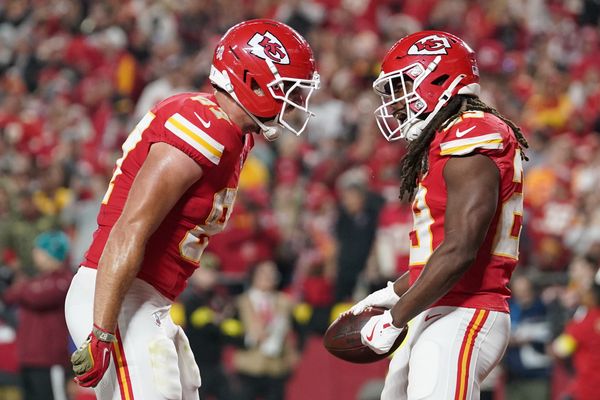 Oct 27, 2025; Kansas City, Missouri, USA; Kansas City Chiefs running back Kareem Hunt (29) celebrates after scoring a touchdown against the Washington Commanders with tight end Travis Kelce (87) during the third quarter of the game at GEHA Field at Arrowhead Stadium. Mandatory Credit: Denny Medley-Imagn Images