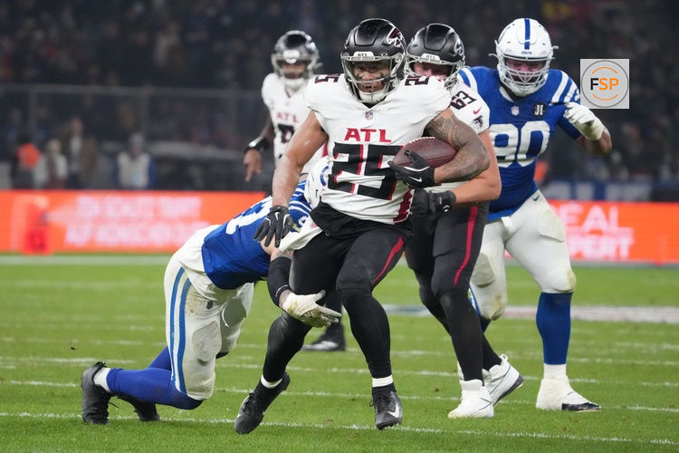 Nov 9, 2025; Berlin, Germany; Atlanta Falcons running back Tyler Allgeier (25) runs the ball against the Indianapolis Colts during the NFL Berlin Game at Olympic Stadium. Credit: Kirby Lee-Imagn Images