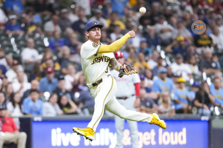 Sep 17, 2024; Milwaukee, Wisconsin, USA;  Milwaukee Brewers third baseman Joey Ortiz (3) throws to first base during the sixth inning against the Philadelphia Phillies at American Family Field. Credit: Jeff Hanisch-Imagn Images