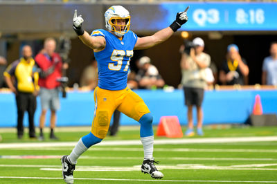 Sep 8, 2024; Inglewood, California, USA;  Los Angeles Chargers linebacker Joey Bosa (97) celebrates after forcing a fumble in the second half against the Las Vegas Raiders at SoFi Stadium. Mandatory Credit: Jayne Kamin-Oncea-Imagn Images