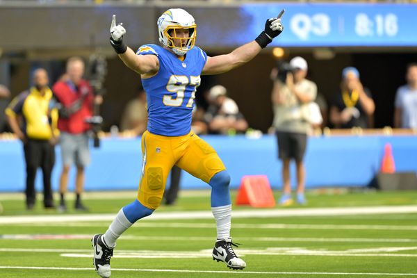 Sep 8, 2024; Inglewood, California, USA;  Los Angeles Chargers linebacker Joey Bosa (97) celebrates after forcing a fumble in the second half against the Las Vegas Raiders at SoFi Stadium. Mandatory Credit: Jayne Kamin-Oncea-Imagn Images