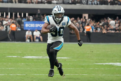 Sep 22, 2024; Paradise, Nevada, USA; Carolina Panthers running back Chuba Hubbard (30) carries the ball against the Las Vegas Raiders at the second half at Allegiant Stadium. Mandatory Credit: Kirby Lee-Imagn Images