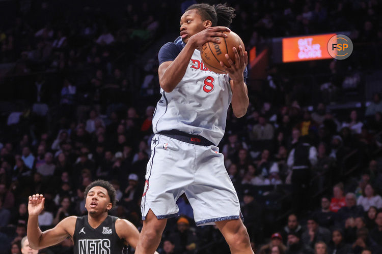 Feb 5, 2025; Brooklyn, New York, USA;  Washington Wizards guard Bub Carrington (8) grabs a rebound in the third quarter against the Brooklyn Nets at Barclays Center. Credit: Wendell Cruz-Imagn Images