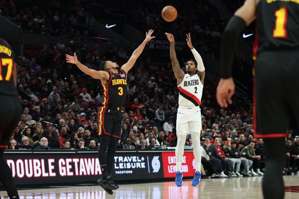 Jan 15, 2026; Portland, Oregon, USA;  Portland Trail Blazers guard Caleb Love (2) shoots the ball over Atlanta Hawks guard CJ McCollum (3) during the first half at Moda Center. Mandatory Credit: Jaime Valdez-Imagn Images