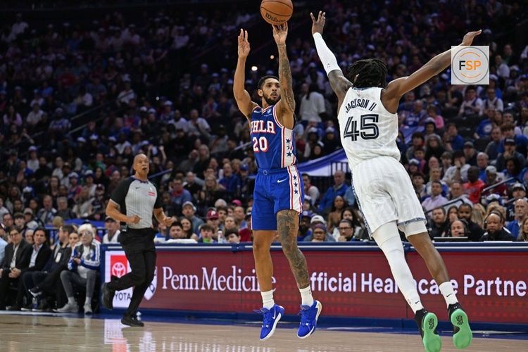 Mar 10, 2026; Philadelphia, Pennsylvania, USA; Philadelphia 76ers guard Cameron Payne (20) shoots a three point basket over Memphis Grizzlies forward GG Jackson (45) during the second half at Xfinity Mobile Arena. Credit: Eric Hartline-Imagn Images