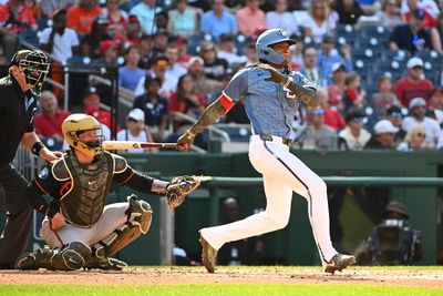 May 16, 2026; Washington, District of Columbia, USA; Washington Nationals shortstop CJ Abrams (5) doubles against the Baltimore Orioles during the second inning at Nationals Park. Mandatory Credit: Brad Mills-Imagn Images