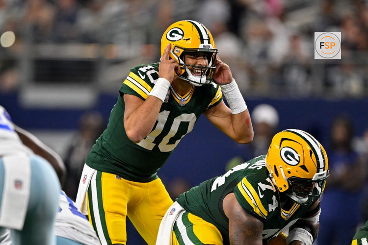 Sep 28, 2025; Arlington, Texas, USA; Green Bay Packers quarterback Jordan Love (10) looks to set the play during the game between the Dallas Cowboys and the Green Bay Packers at AT&T Stadium. Credit: Jerome Miron-Imagn Images