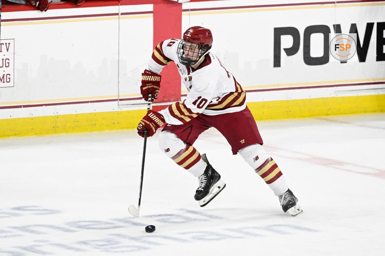 Feb 28, 2025; Chestnut Hill, MA, USA; Boston College forward James Hagens (10) skates with the puck during the second period against the University of New Hampshire Wildcats at Conte Forum. Credit: Eric Canha-Imagn Images