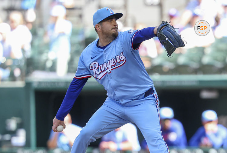 May 4, 2025; Arlington, Texas, USA;  Texas Rangers relief pitcher Luke Jackson (77) throws during the ninth inning against the Seattle Mariners at Globe Life Field. Credit: Kevin Jairaj-Imagn Images