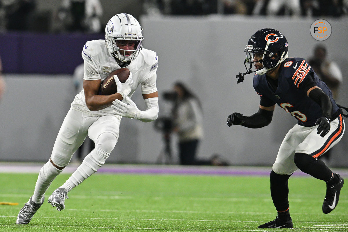 Dec 16, 2024; Minneapolis, Minnesota, USA; Minnesota Vikings wide receiver Justin Jefferson (18) runs after the catch as Chicago Bears cornerback Kyler Gordon (6) defends during the second quarter at U.S. Bank Stadium. Credit: Jeffrey Becker-Imagn Images