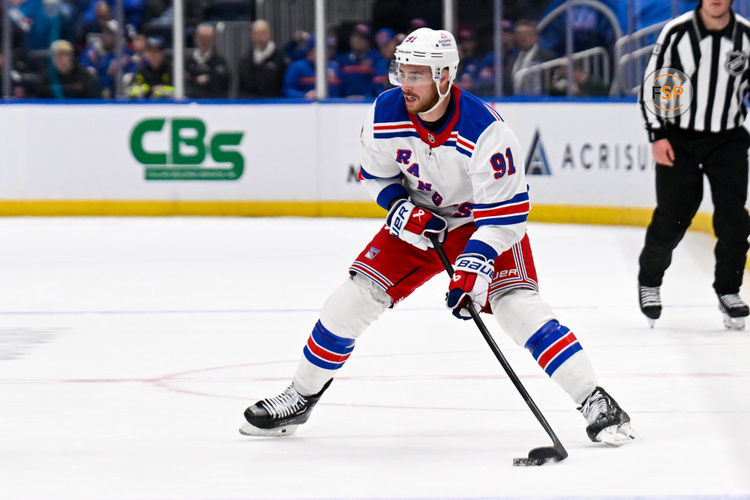 Feb 25, 2025; Elmont, New York, USA;  New York Rangers right wing Reilly Smith (91) looks to pass against the New York Islanders during the third period at UBS Arena. Credit: Dennis Schneidler-Imagn Images