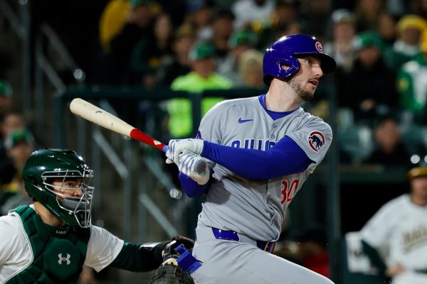 Mar 31, 2025; West Sacramento, California, USA; Chicago Cubs outfielder Kyle Tucker (30) hits a single during the fifth inning against the Athletics at Sutter Health Park. Mandatory Credit: Sergio Estrada-Imagn Images