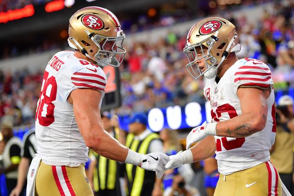 Oct 2, 2025; Inglewood, California, USA;  San Francisco 49ers running back Christian McCaffrey (23) reacts with  tight end Jake Tonges (88) after scoring a touchdown during the first half at SoFi Stadium. Mandatory Credit: Gary A. Vasquez-Imagn Images