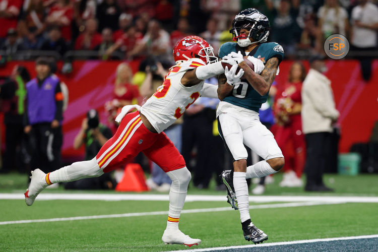 Feb 9, 2025; New Orleans, LA, USA; Philadelphia Eagles wide receiver DeVonta Smith (6) makes a catch for a touchdown against Kansas City Chiefs cornerback Jaylen Watson (35) during the second half of Super Bowl LIX at Caesars Superdome. Credit: Geoff Burke-Imagn Images