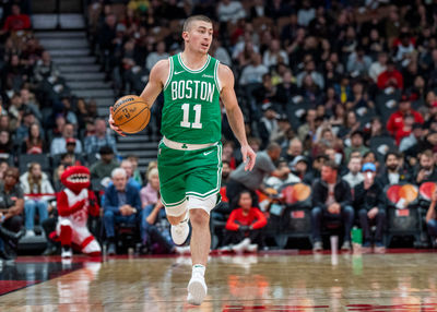 Oct 15, 2024; Toronto, Ontario, CAN; Boston Celtics guard Payton Pritchard (11) dribbles the ball against the Toronto Raptors during the first half at Scotiabank Arena. Mandatory Credit: Kevin Sousa-Imagn Images